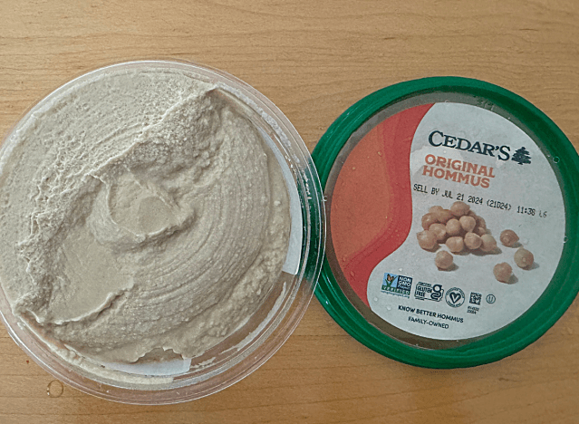 cedars hummus container open on a table 