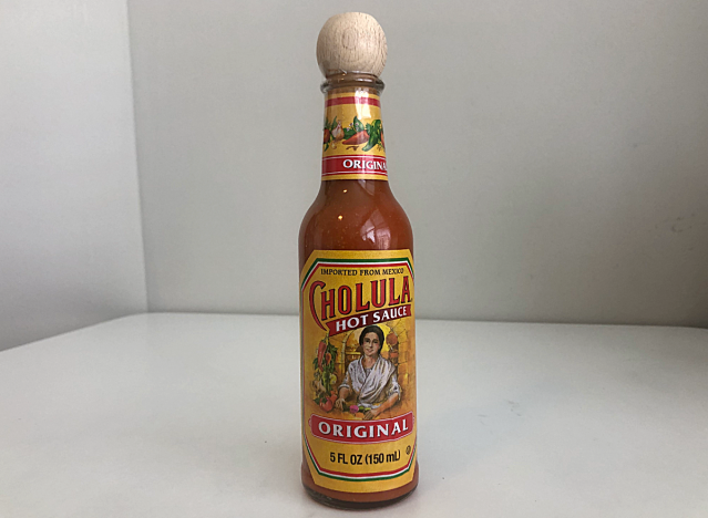 a bottle of cholula hot sauce 