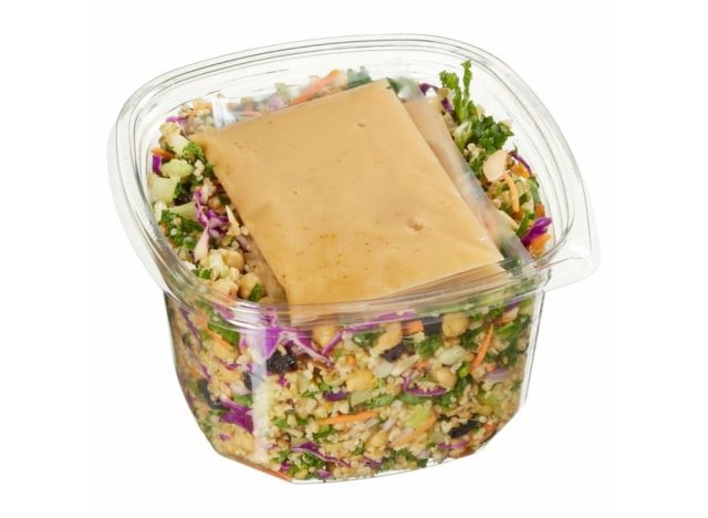 container of costco's grain + celery salad with packet of apple cider vinaigrette