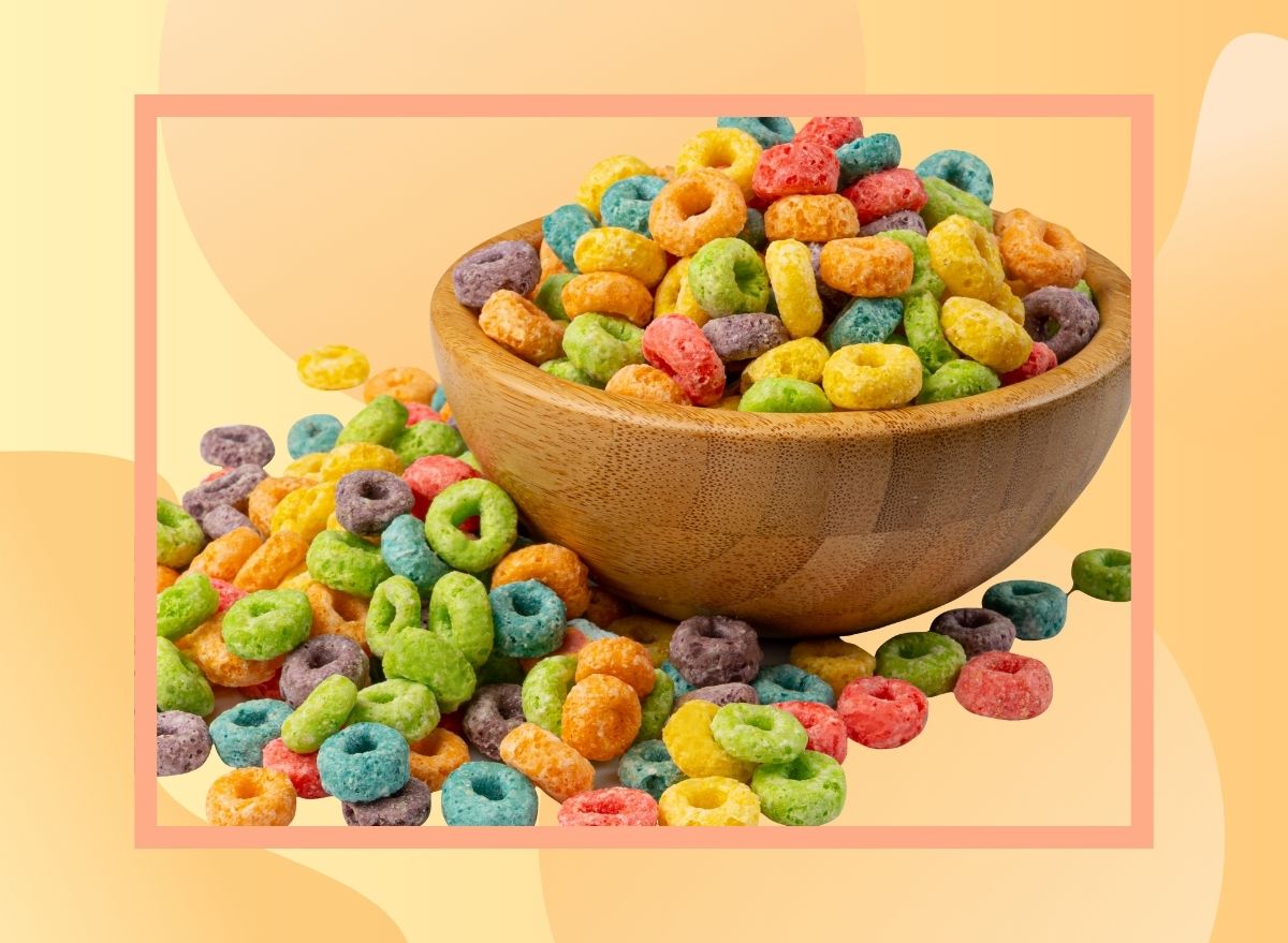 a photo of a bowl of froot loops on a designed yellow and peach background