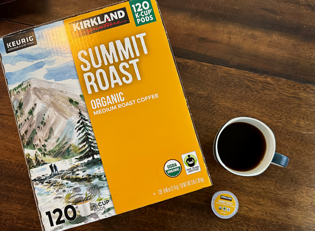 kirkland summit roast k cups box next to a mjug of coffee 