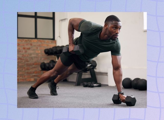 fit, muscular man performing renegade rows with dumbbells at the gym