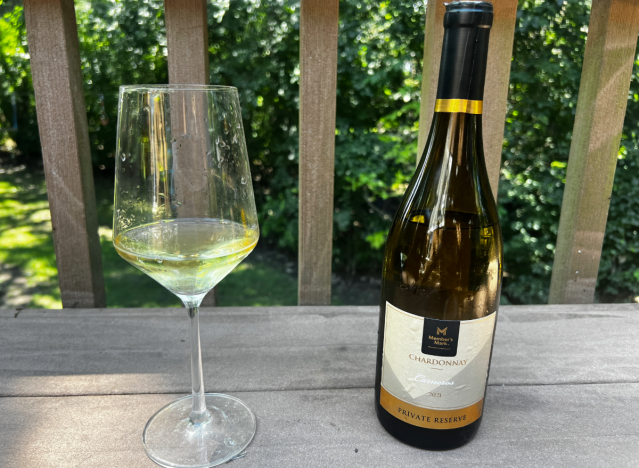 members mark chardonnay private reserve bottle next to a glass 