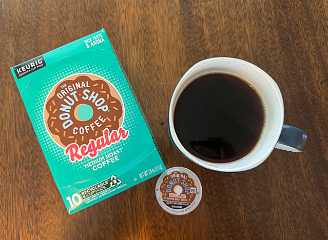 original donut shop k cup box with mug of coffee 