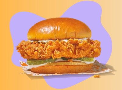 popeyes chicken sandwich on colorful background
