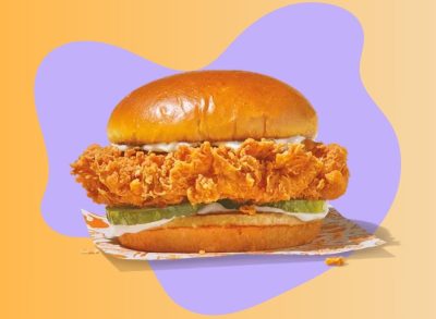 popeyes' classic chicken sandwich on a colorful designed background