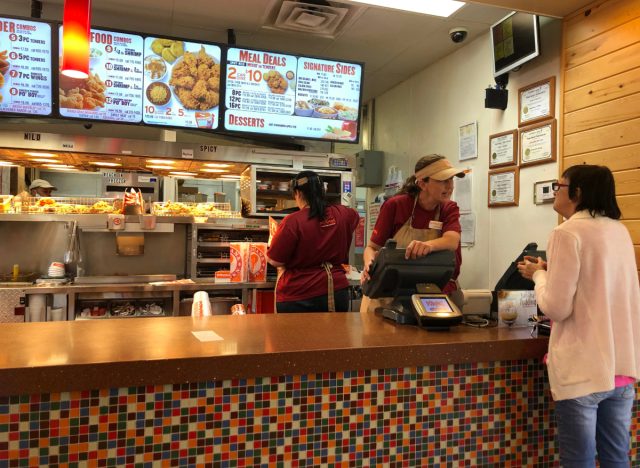 Popeyes Employee Ringing Up Customer ?quality=82&strip=all&w=640