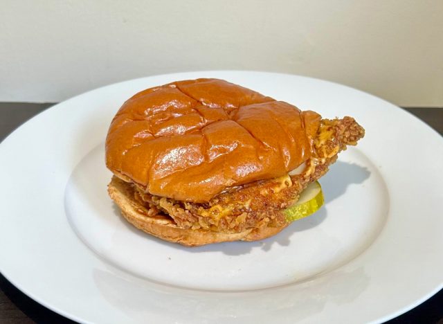 popeyes spicy chicken sandwich on a white plate