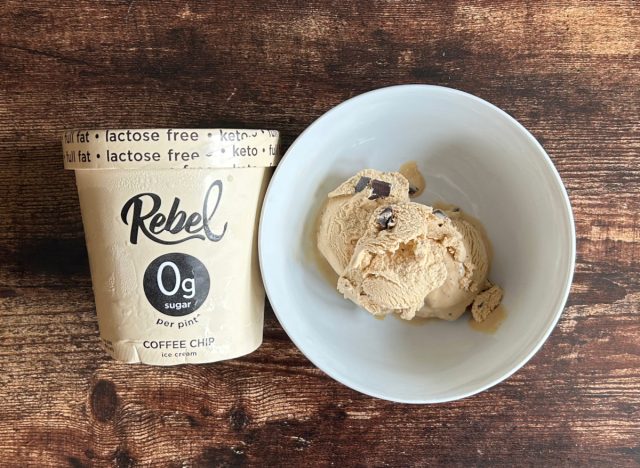 pint of rebel coffee chip ice cream next to a bowl of the ice cream