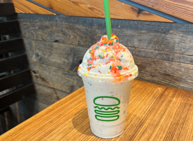 shake shack strawberry donut shake on a table