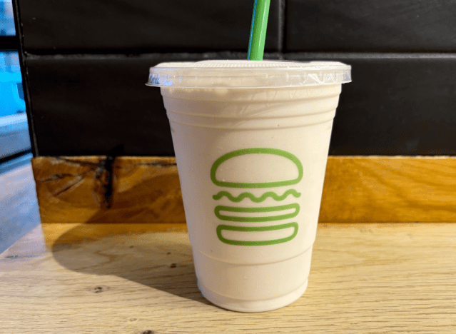 shake shack strawberry shake on a table