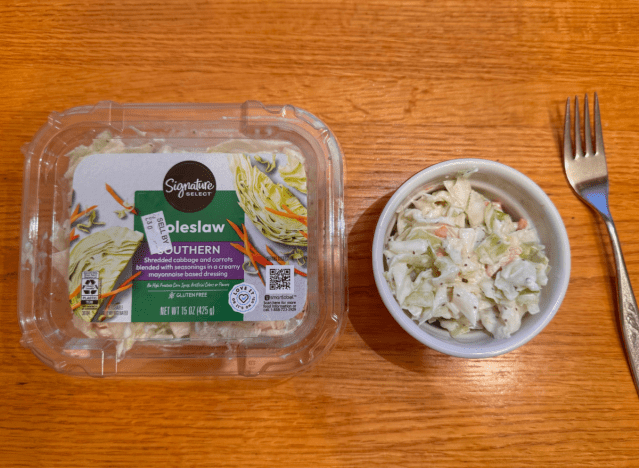 signature select coleslaw in container and a dish