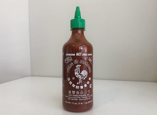 a bottle of sriracha hot sauce 