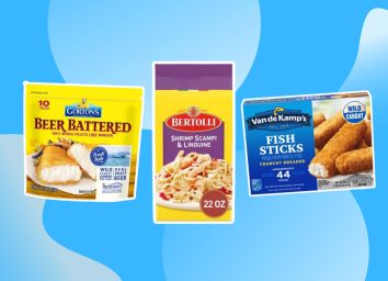 three packages of frozen seafood on a blue background