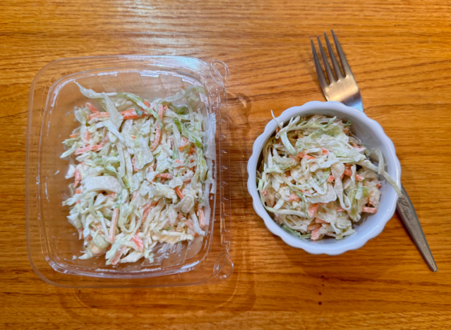 whole foods coleslaw in container and a dish