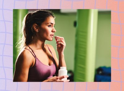 woman taking a magnesium supplement at the gym