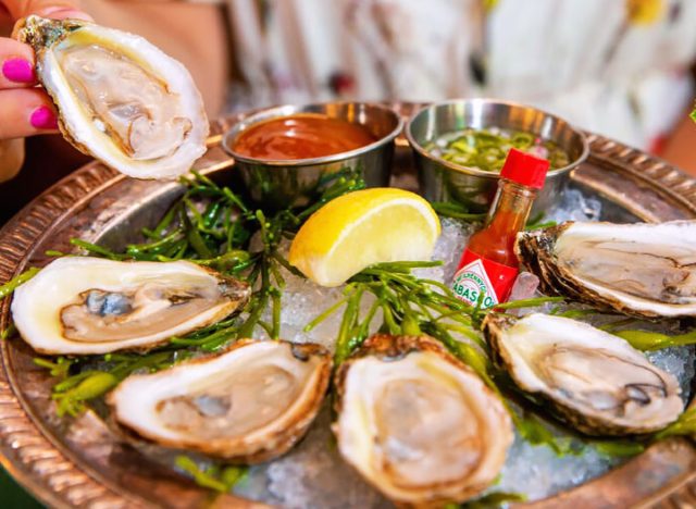 A platter of chilled raw oysters on the half shell at Bill's Oyster in Austin, Texas.