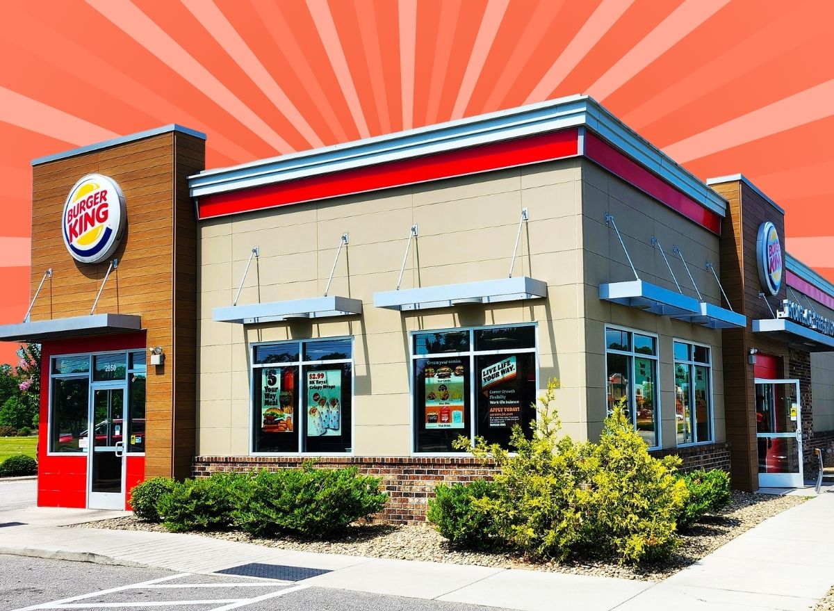 Burger King storefront on striped red background