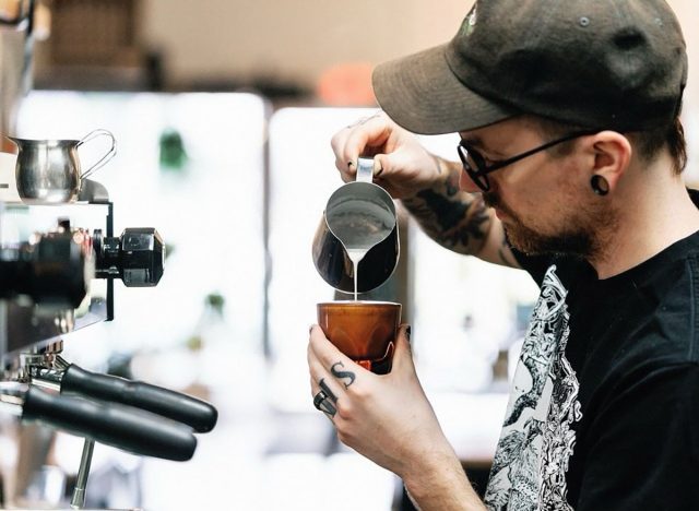 A barista pours steamed milk into an espresso cup at Florin Coffee in Columbus, Ohio.