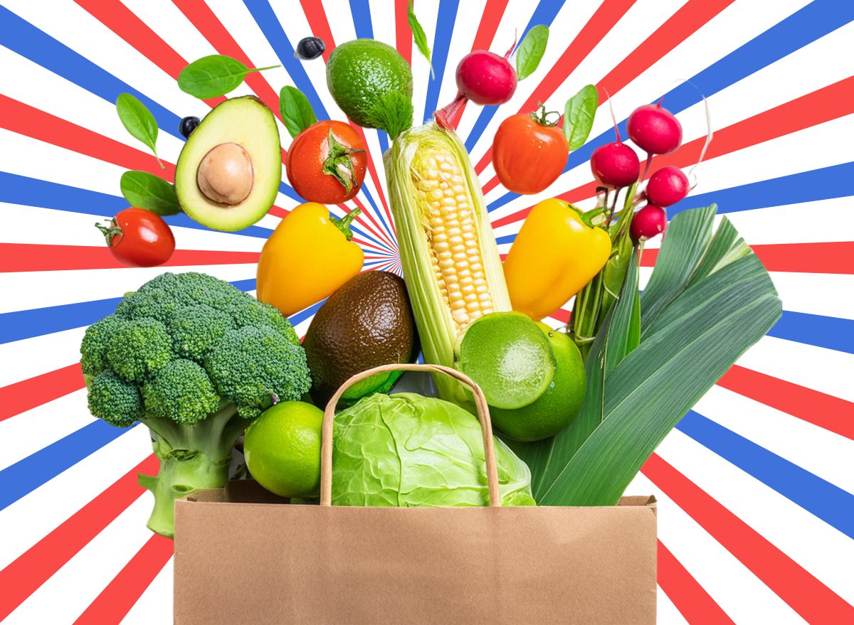 A supermarket haul of fresh produce in a paper bag set against a colorful background.