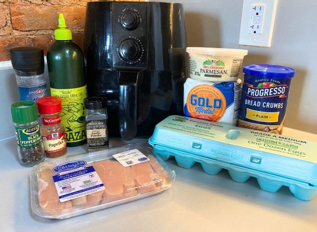 air fryer and ingredients for chicken tenders