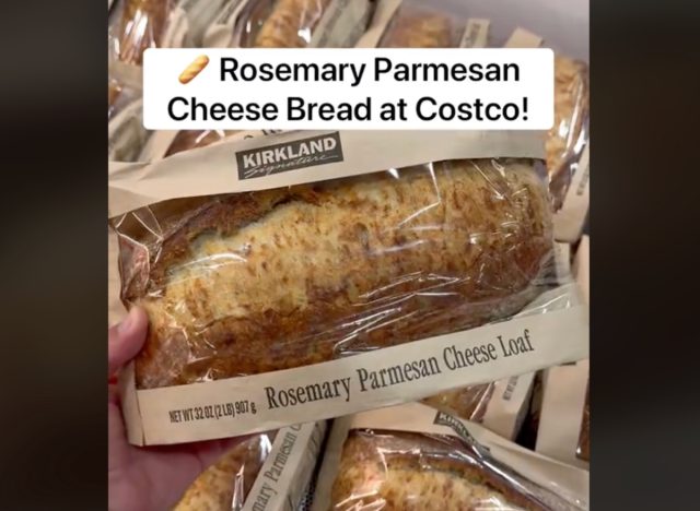 screenshot of person holding costco rosemary parmesan cheesebread