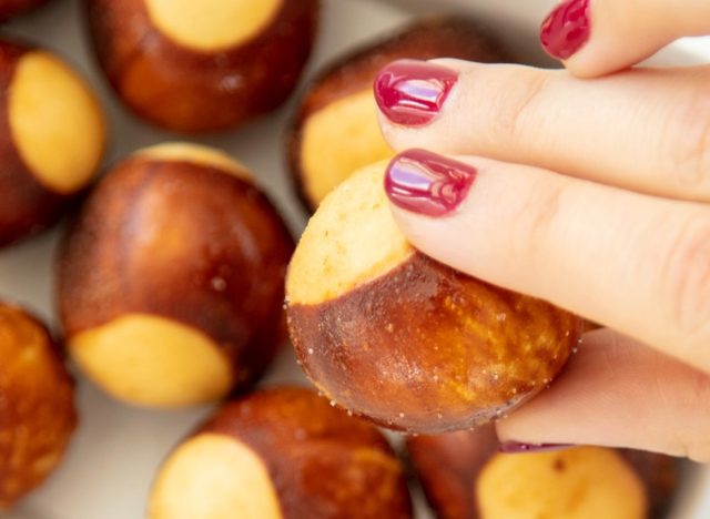 hand holding culver's pretzel bite