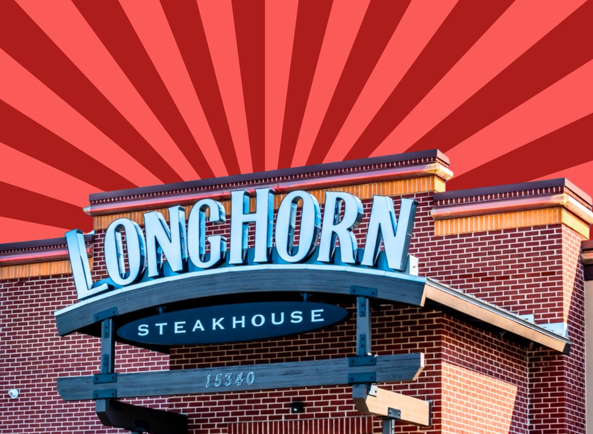 longhorn steakhouse sign in front of a red and pink background