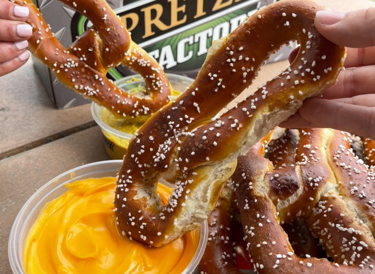 people dipping philly pretzel factory pretzels into dips