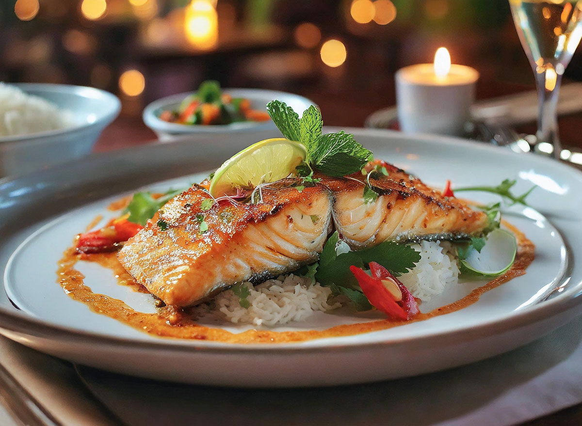 A luxurious salmon dinner in a restaurant setting