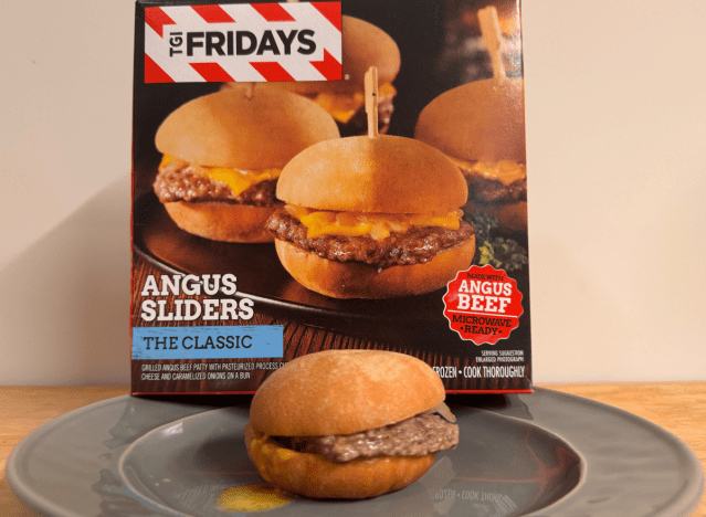 a box of tgi fridays sliders with a slider on a plate 