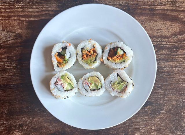 trader joe's vegetable rolls and california rolls on a plate