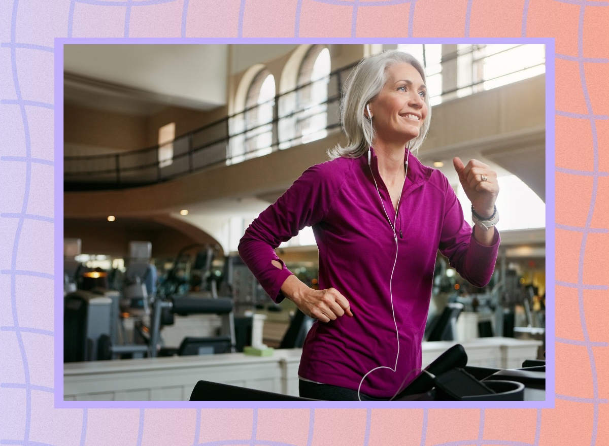 happy, fit, mature woman doing treadmill workout at the gym