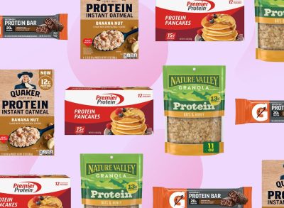 pre-packaged high protein foods on a pink background