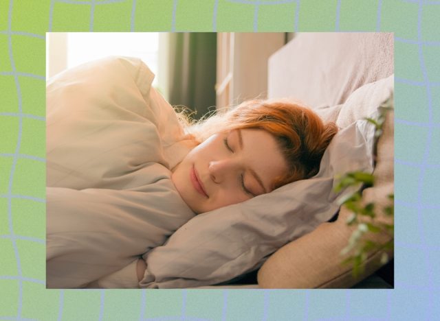 woman sleeping in a cozy bed with a fluffy comforter and pillows