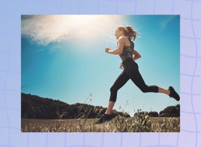 woman sprinting through field on sunny day, running workout