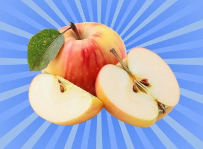 Two Honeycrisp apples, one sliced up, set against a vibrant blue background.