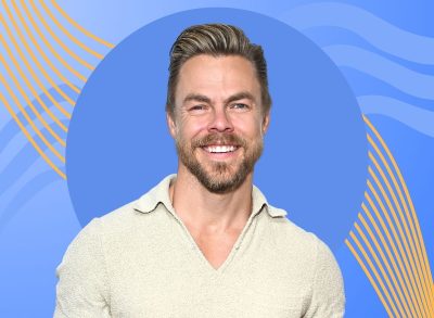 a photo of derek hough on a designed blue background