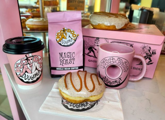 Voodoo Doughnut coffee, Dirty Chai Doughnut, and Pink Mug on table