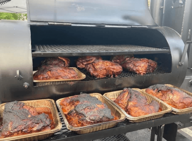 meats in a smoker at blinky's offset bbq