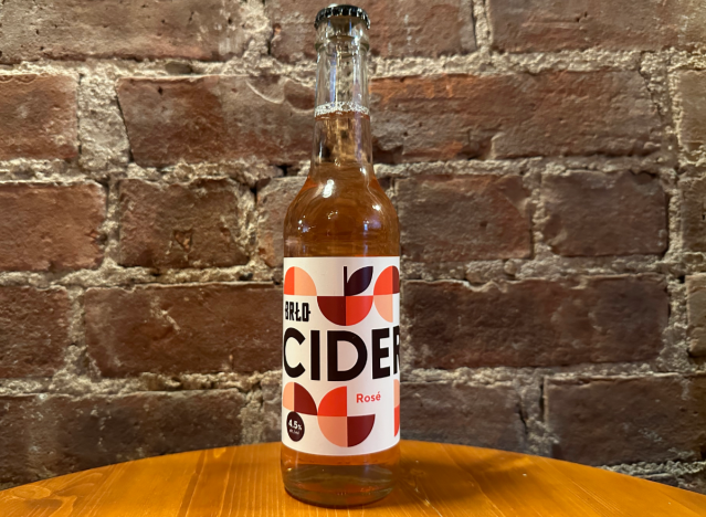 brlo rose cider in a bottle on a table