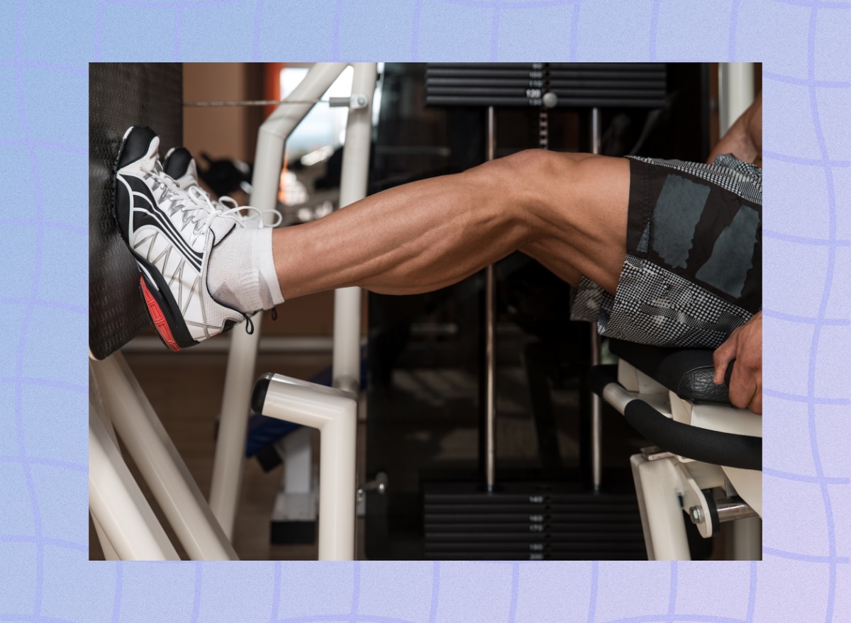 close-up of muscular calves doing calf press exercise