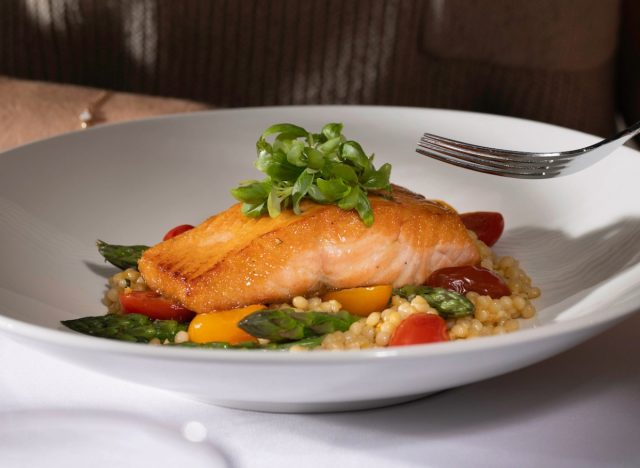 the capital grille's seared citrus glazed salmon with couscous, asparagus, and heirloom tomatoes