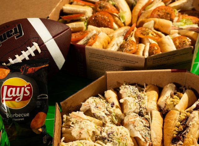 capriotti's sandwich catering next to a football and lay's bbq chips