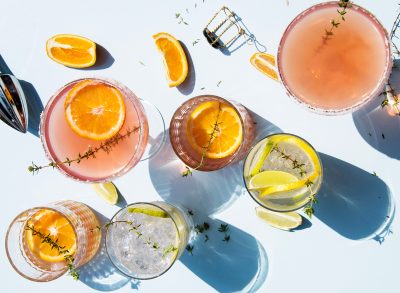 overhead view of multiple cocktails flat lay