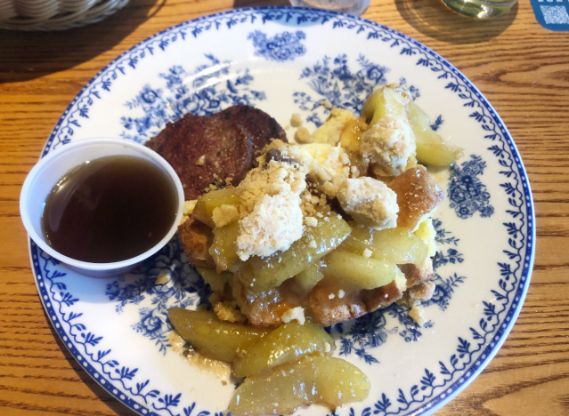 cracker barrel fried apple french toast bake on a blue and white printed plate 