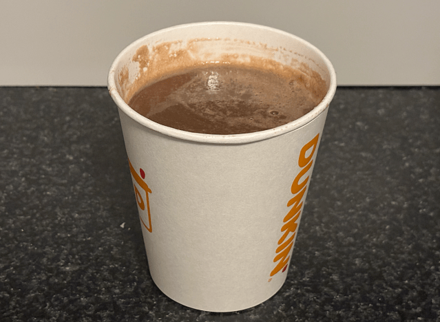 an open cup of dunkin hot chocolate 