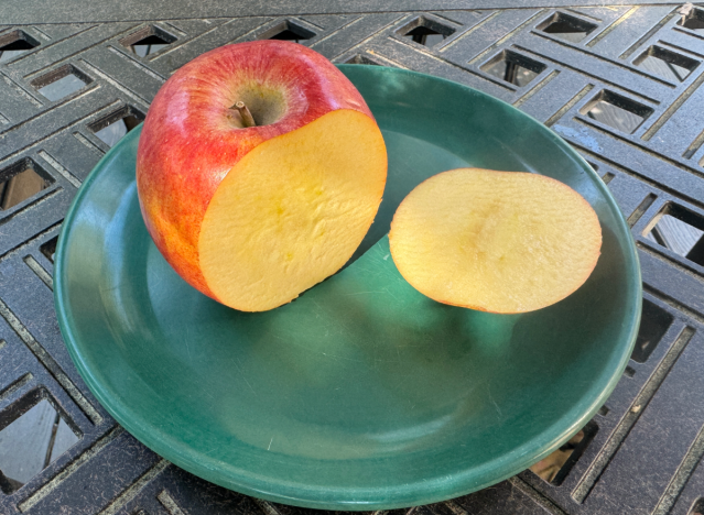 envy apple cut open on a plate 