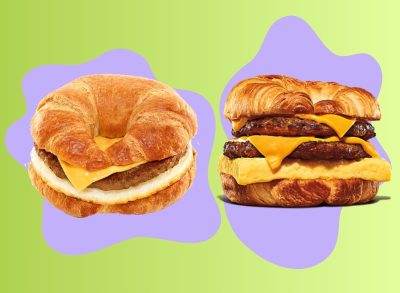 Croissant breakfast sandwiches from Dunkin' and Burger King set against a colorful background