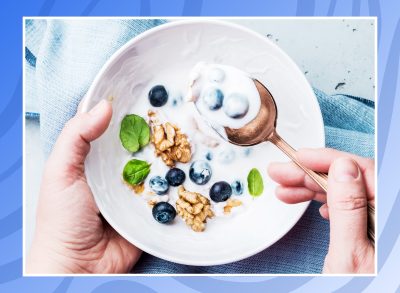 bowl of high protein yogurt with blueberries and walnuts